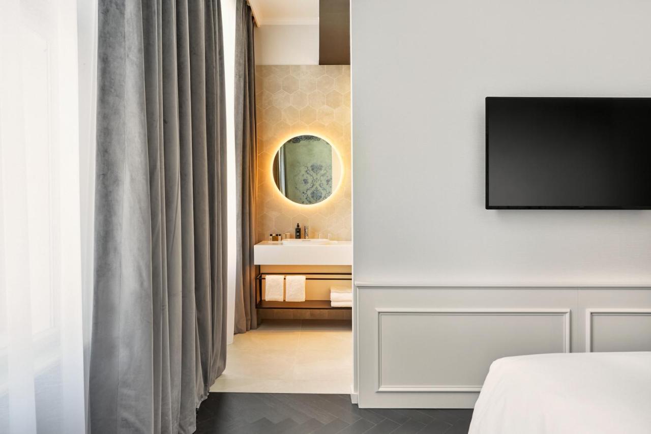 Hyperion Hotel Salzburg Bagian luar foto A room at the hotel